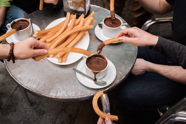 No dejes de probar algunos de los mejores churros de Málaga en Café Madrid.